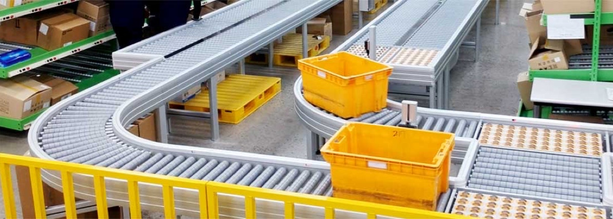 Roller conveyor curves with sliding properties, modern conveyor curves, contemporary conveyor system with roller-conveyor curves